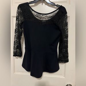 Express Women’s Peplum Lace Sleeve Tee in a size L.